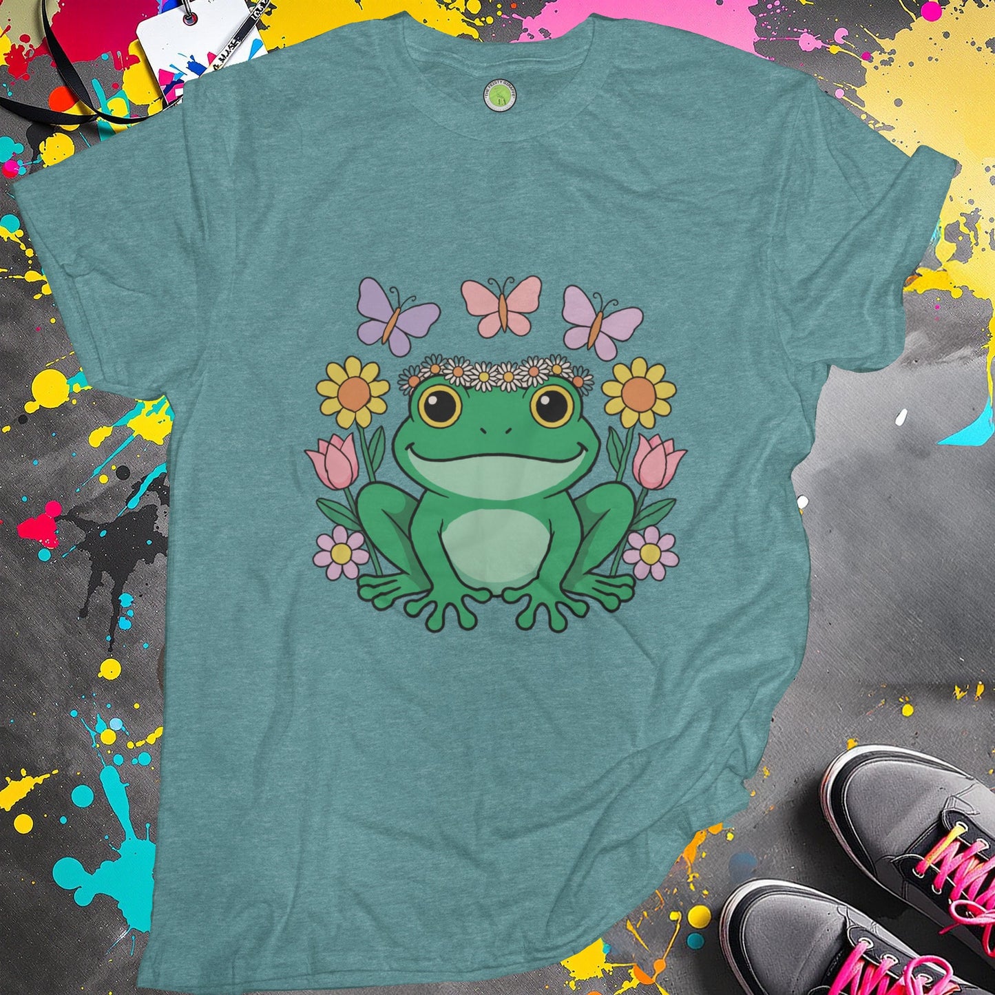 Colorful frog floral design on teal T-shirt product