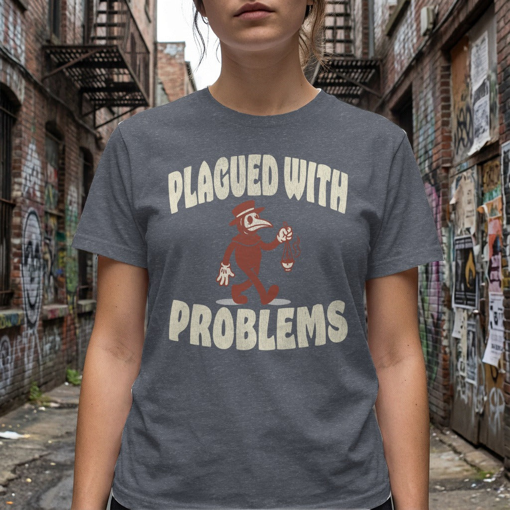 Dark grey t-shirt with a plague doctor graphic and text "PLAGUED WITH PROBLEMS".