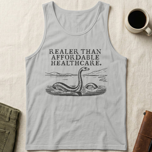 Gray tank top with Loch Ness Monster graphic and text "Realer Than Affordable Healthcare."