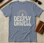 Blue t-shirt with "DEEPLY UNWELL" graphic and candle design.