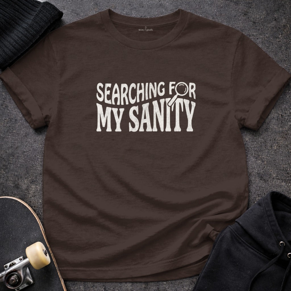 Searching For My Sanity Funny Graphic Tee product type
Sanity Quote, Searching Sanity, Funny Shirt, Sarcastic Tee, Graphic TShirt, Humorous Design, Mental Health Humor, Life Struggles, Stress Relief, Unique Apparel, Casual Clothing, Everyday Wear, Gift Idea, Unisex Shirt, Dark Brown Shirt, Quote Top, Magnifying Glass, Distressed Print, Funky Text, Adult Sarcasm