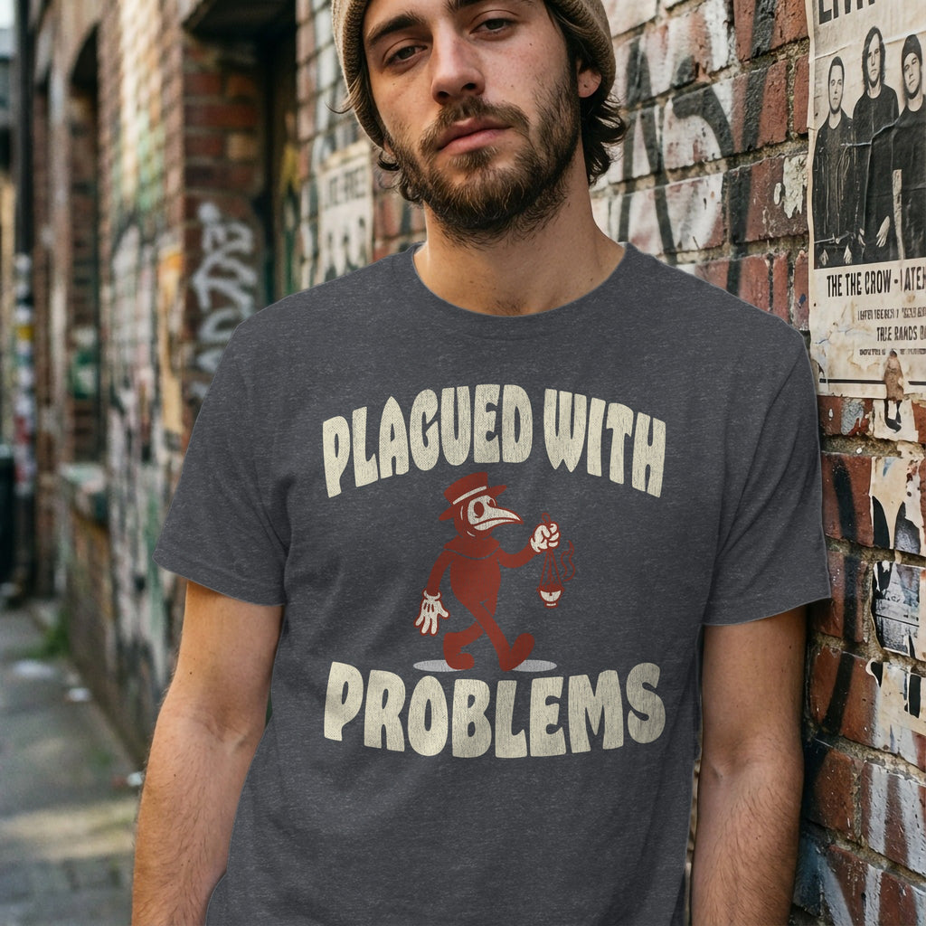 Man wearing a dark gray t-shirt with "PLAGUED WITH PROBLEMS" text and graphic.