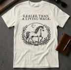White t-shirt with "Realear than a living wage" and unicorn illustration.