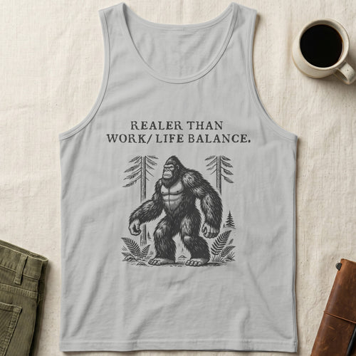 Grey tank top with Bigfoot graphic and "Realer Than Work/Life Balance." text.