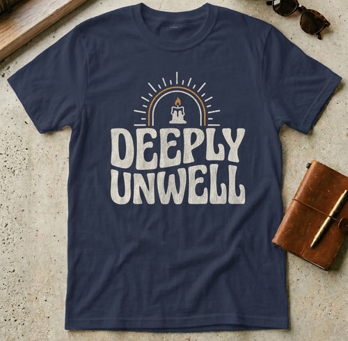Navy t-shirt with "DEEPLY UNWELL" text and a candle graphic.