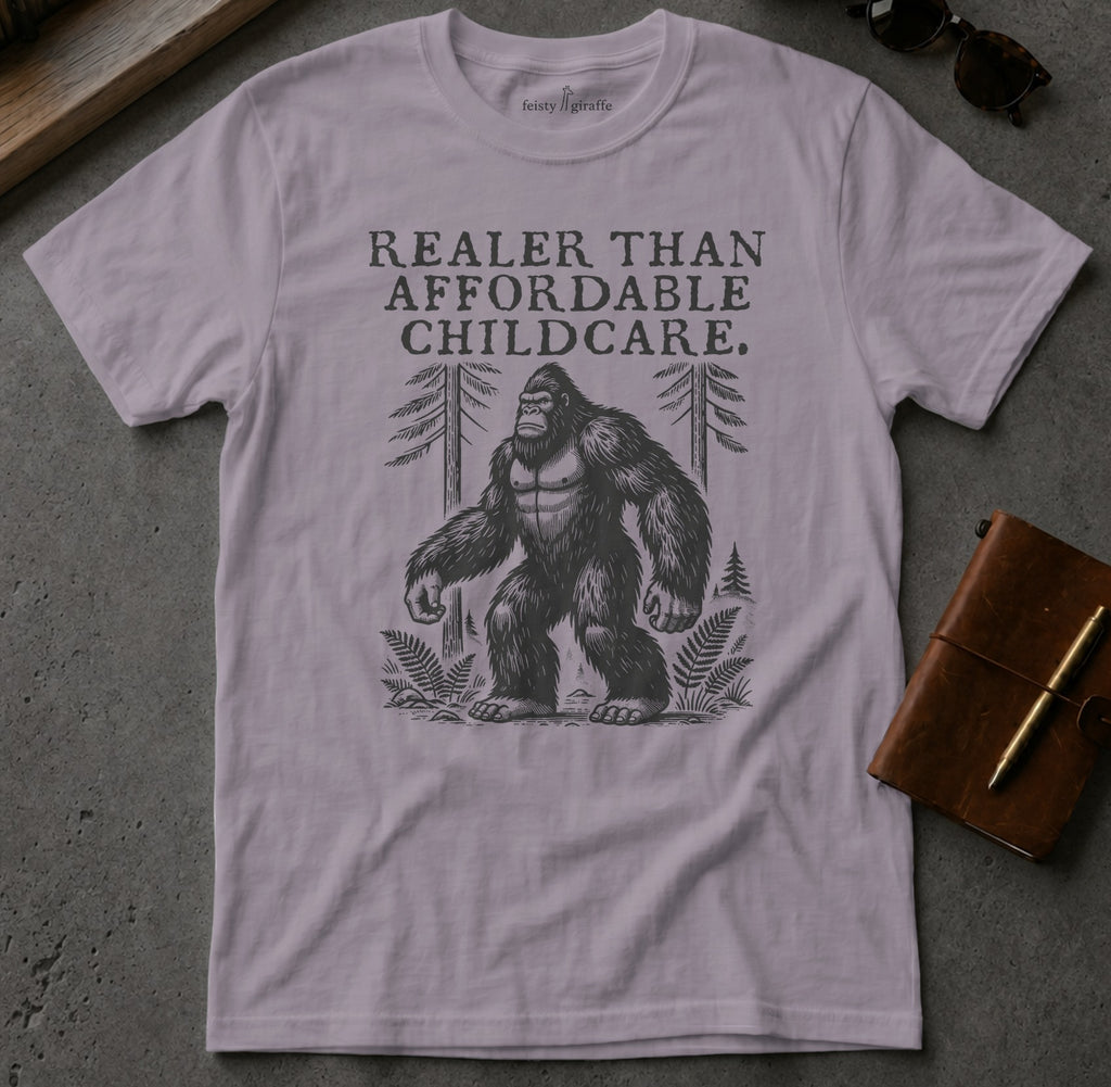 Shirt with Bigfoot graphic and text "Realer Than Affordable Childcare."