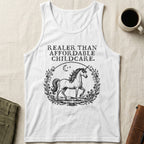 White tank top with unicorn and moon graphic and text "REALER THAN AFFORDABLE CHILDCARE."