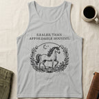 Grey tank top with unicorn and moon graphic, text "Realer Than Affordable Housing."