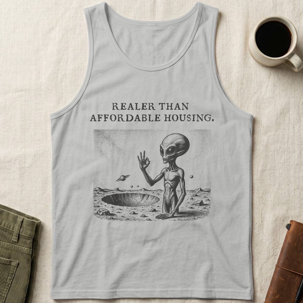 Alien in crater below text "REALER THAN AFFORDABLE HOUSING."
