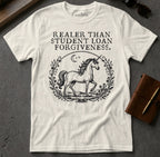 White t-shirt with a unicorn illustration and text "Realest Than Student Loan Forgiveness".