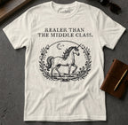 White t-shirt with a unicorn illustration and "Realer Than The Middle Class." text.