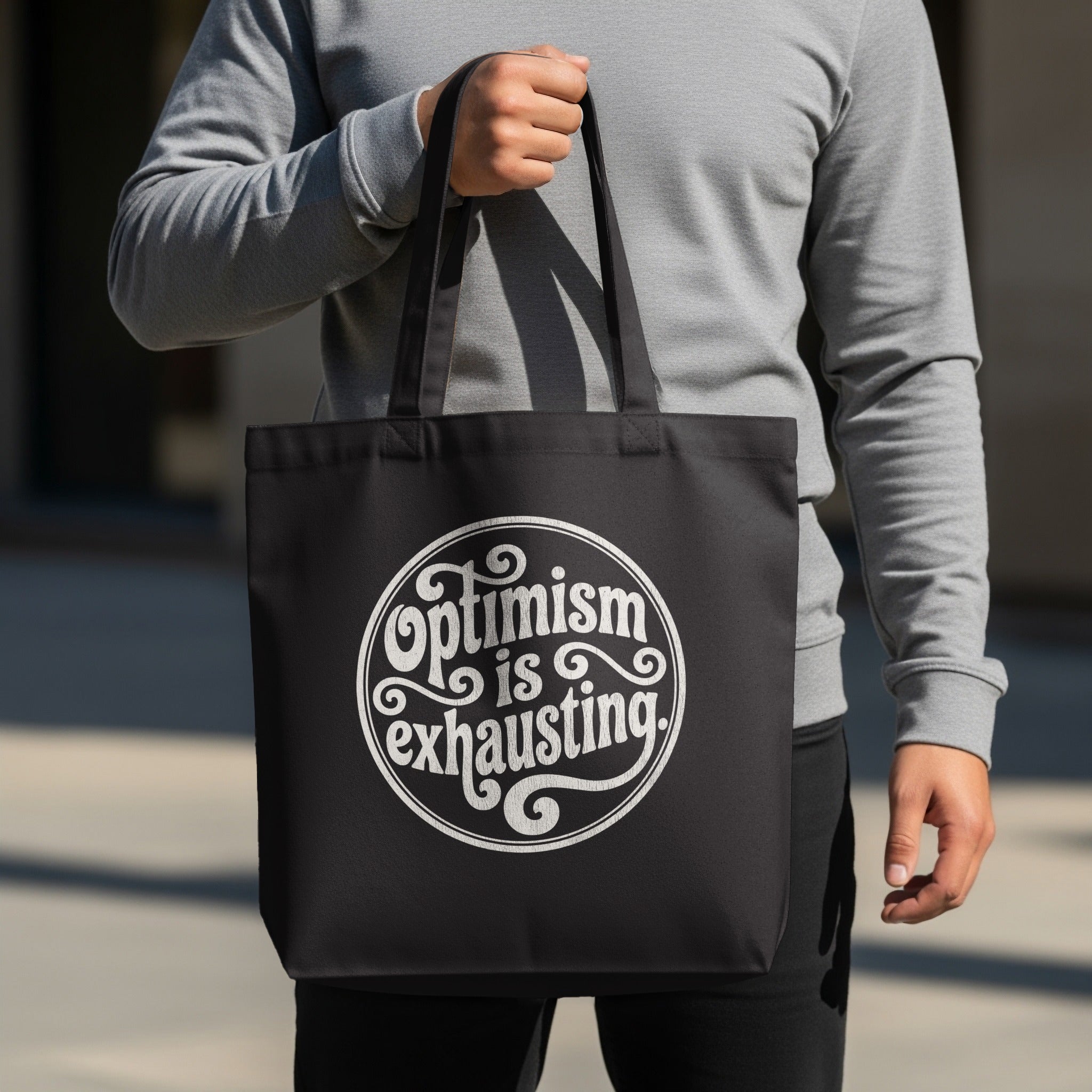Optimism is exhausting black tote bag product type