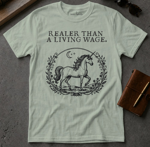 Light green t-shirt with unicorn illustration and text "REALER THAN A LIVING WAGE."