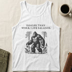 White tank top with Bigfoot illustration and "Real than work/life balance" text.