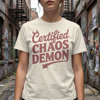Cream t-shirt with "Certified Chaos Demon" text in maroon.