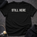 Printify T-shirt S / Black Still Here T-Shirt