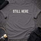 Printify T-shirt S / Charcoal Still Here T-Shirt