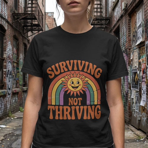 Printify t-shirt Surviving Not Thriving Tee